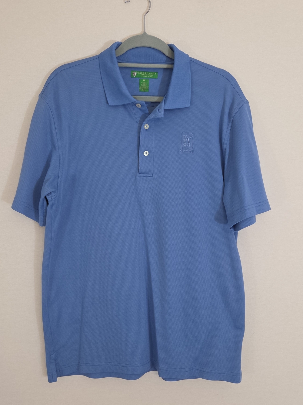 Men's Light Blue Polo Shirt with Subtle Embroidered Crest